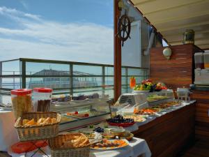 a buffet line with food on a cruise ship at Burckin Hotel in Istanbul