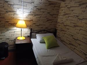 Cama o camas de una habitación en Airport Travelodge Manila