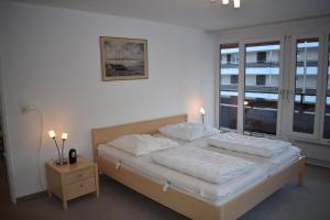 Postel nebo postele na pokoji v ubytování Sursilvana 18 (317 Ma)