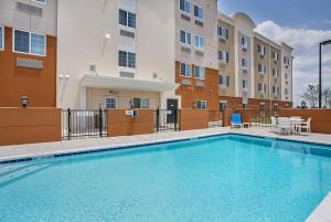 a large swimming pool in a large room at Candlewood Suites Oak Grove/Fort Campbell, an IHG Hotel in Oak Grove