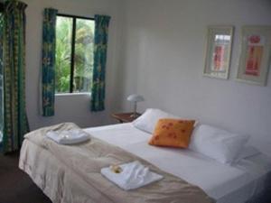 Ein Bett oder Betten in einem Zimmer der Unterkunft Bohemia Resort Cairns