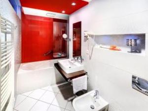 Phòng tắm tại Wellness Hotel Chopok