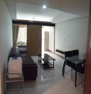 Khu vực ghế ngồi tại Mataram City Apartment 700 Sadewa
