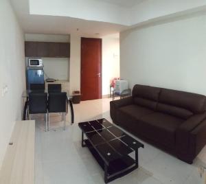 Khu vực ghế ngồi tại Mataram City Apartment 700 Sadewa