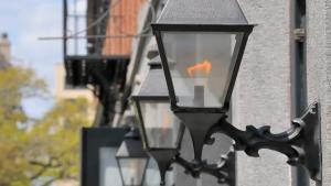 a group of lights on the side of a building at Hotel Indigo Savannah Historic District by IHG in Savannah +70 photos