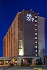 a large building with a clock on the front of it at Crowne Plaza Hotel-Newark Airport, an IHG Hotel in Newark