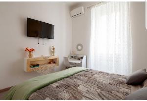 Tempat tidur dalam kamar di ControVento Apartament