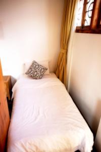 Tongli Begonia Flowers Guesthouse客房内的一张或多张床位
