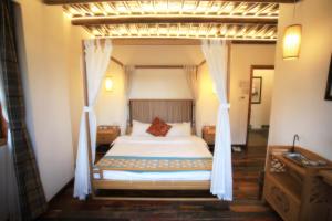 Tongli Begonia Flowers Guesthouse客房内的一张或多张床位