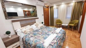 Ein Bett oder Betten in einem Zimmer der Unterkunft Herc Apartments Sarajevo