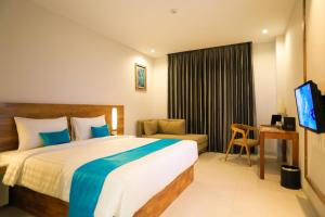 Katil atau katil-katil dalam bilik di Pollos Hotel & Gallery