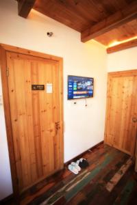 Tongli Begonia Flowers Guesthouse客房内的一张或多张床位
