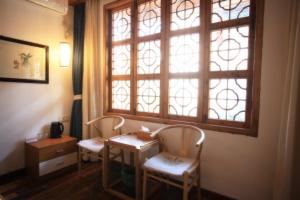 Tongli Begonia Flowers Guesthouse的休息区
