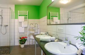 Koupelna v ubytování Pension Sendlhofer + 13 fotografií