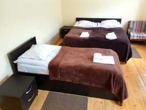 Katil atau katil-katil dalam bilik di Red Stone Guest House