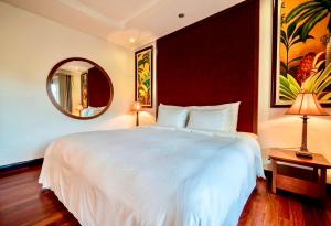 Katil atau katil-katil dalam bilik di Charming 4 Bedrooms Villas with few step to beach