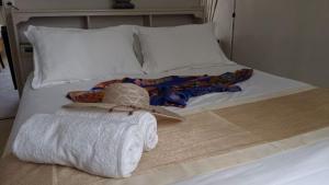 A bed or beds in a room at Lharmonie Villa