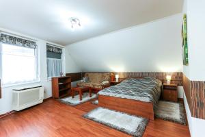 Posteľ alebo postele v izbe v ubytovaní GÁRDI APARTMAN + 37 fotografií