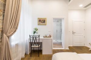 Posteľ alebo postele v izbe v ubytovaní Pellegrini Luxury Rooms