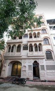 a motorcycle parked in front of a building at Jashoda Mystic Haveli in Pushkar