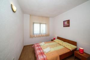 Postel nebo postele na pokoji v ubytování Holiday home Sego