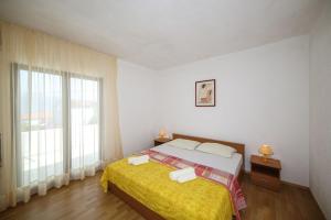 Postel nebo postele na pokoji v ubytování Holiday home Sego