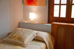 Postel nebo postele na pokoji v ubytování Casas Rurales Pradina I y II