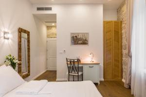Posteľ alebo postele v izbe v ubytovaní Pellegrini Luxury Rooms