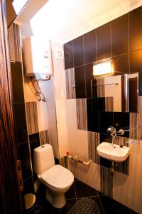 Koupelna v ubytování Студия и Стаи за гости -жк Пентагон + 13 fotografií
