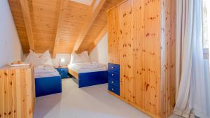 Postel nebo postele na pokoji v ubytování Chalet Millennium
