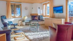 TV a/nebo společenská místnost v ubytování Chalet Millennium