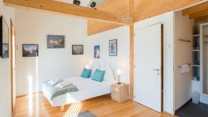 Postel nebo postele na pokoji v ubytování Chalet Roossi