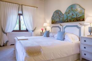 
Een bed of bedden in een kamer bij Wine Resort Dievole
