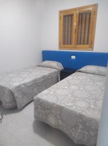 Ein Bett oder Betten in einem Zimmer der Unterkunft TABLERO 402, ESTUPENDO Apto 8 pax cerca PLAYA DEL INGLÉS