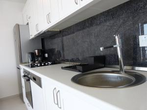 Kuchyňa alebo kuchynka v ubytovaní Apartment NoStress