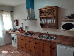 Kuchyň nebo kuchyňský kout v ubytování Casa Rural IRIS + 25 fotografií