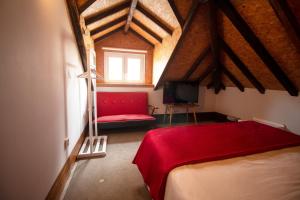 Uma cama ou camas num quarto em Casa com Historia