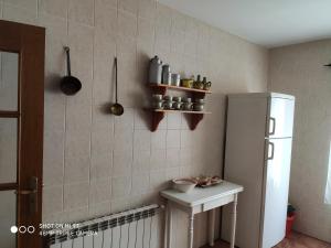 A kitchen or kitchenette at Casa Rural IRIS