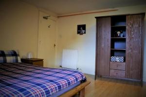 Ліжко або ліжка в номері Leith City Centre Guesthouse Apartment