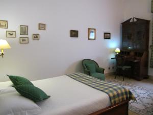 A bed or beds in a room at Quinta Dos Moinhos De Sao Filipe