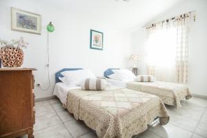 Posteľ alebo postele v izbe v ubytovaní Sevid holiday homes