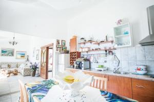 Kuchyňa alebo kuchynka v ubytovaní Sevid holiday homes