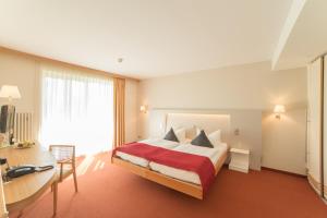 Postel nebo postele na pokoji v ubytování Seehotel Rheinsberg