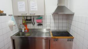 Kuchyň nebo kuchyňský kout v ubytování Hostel am Kurtti + 14 fotografií