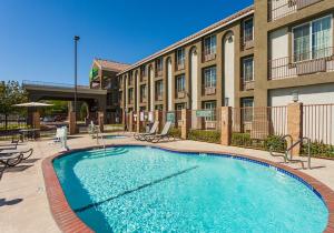 a swimming pool in front of a building at Holiday Inn Express Lancaster, an IHG Hotel in Lancaster