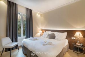 Кровать или кровати в номере Villa Artemys - Five Stars Holiday House