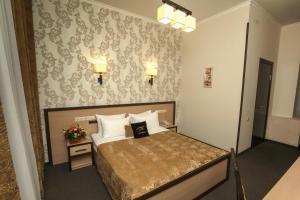 
Кровать или кровати в номере Oasis Hotel
