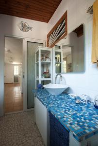 Kuchyň nebo kuchyňský kout v ubytování Marathos beach House