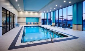 a large swimming pool in a hotel room at Staybridge Suites - Niagara-On-The-Lake, an IHG Hotel in Niagara-on-the-Lake