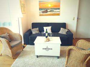 Posezení v ubytování Ferienwohnung Beach Loft im Haus Kühlung